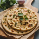Flat bread recipes with toppings on rustic table