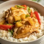 hawaiian chicken crockpot served over rice with pineapple glaze